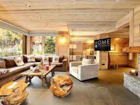 Chalet moderne 5* à Courchevel La Tania - 12 pers, jacuzzi, sauna, skis aux pieds, cheminée, cinéma - FR-1-575-154